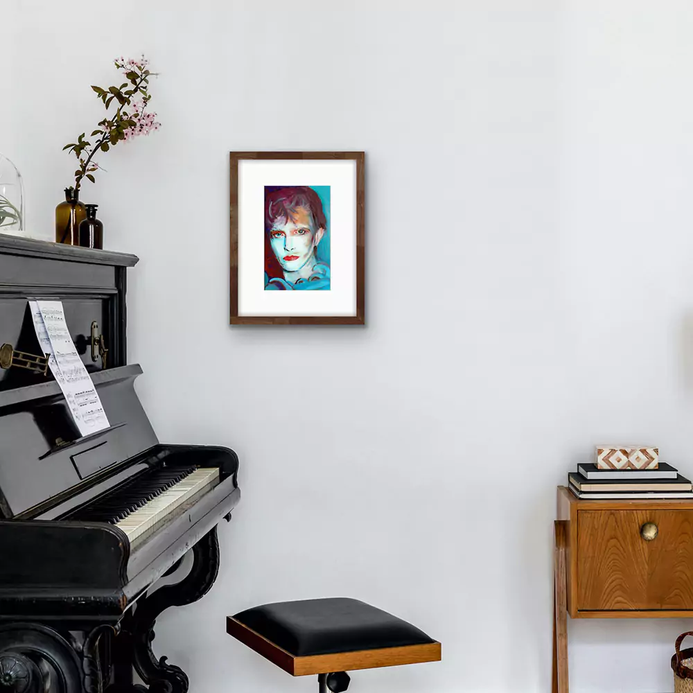 bowie-print-hanging-by-a-piano print of David Bowie from an original painting hanging in a music room