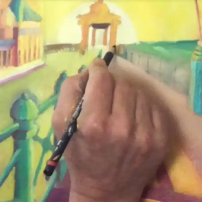 Close up of the artists haand working on a magical realism style painting